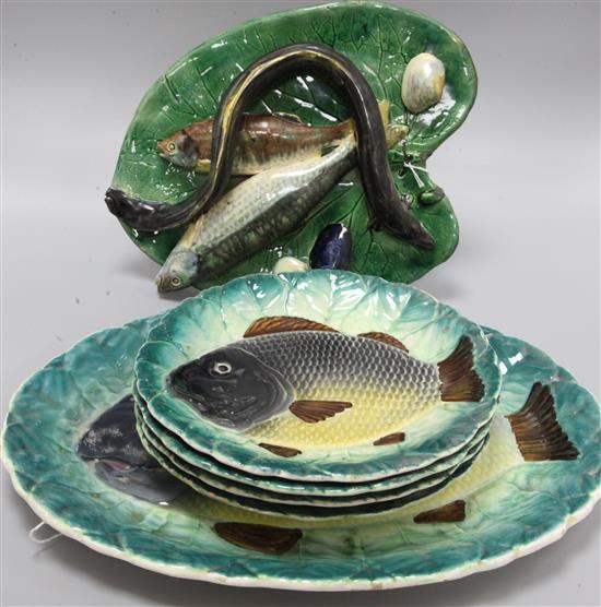 An Alfred Renoleau Palissy style tromp loeil platter and a majolica fish service